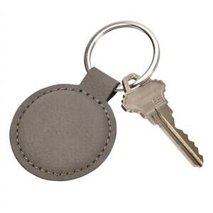NEW CREATIVE GIFTS INTERNATIONAL leatherette round keychain - 1.875" in grey